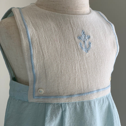 Malo Romper on mannequin , baby boy, cloud blue, cotton romper , close up, embroidery and button detail — Willowby, sizes 6–18 months