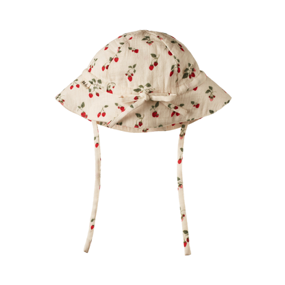 Sun Hat flat lay, baby organic cotton sun hat with brim, strawberry print — Willowby, sizes 6–18 months