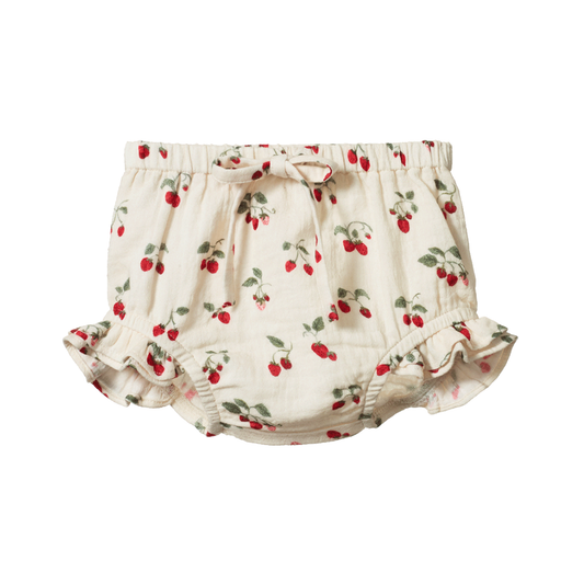 Bloomers flat lay, baby girl organic cotton bloomers, strawberry print, adjustable tie, frill detail  — Willowby, sizes 6–18 months