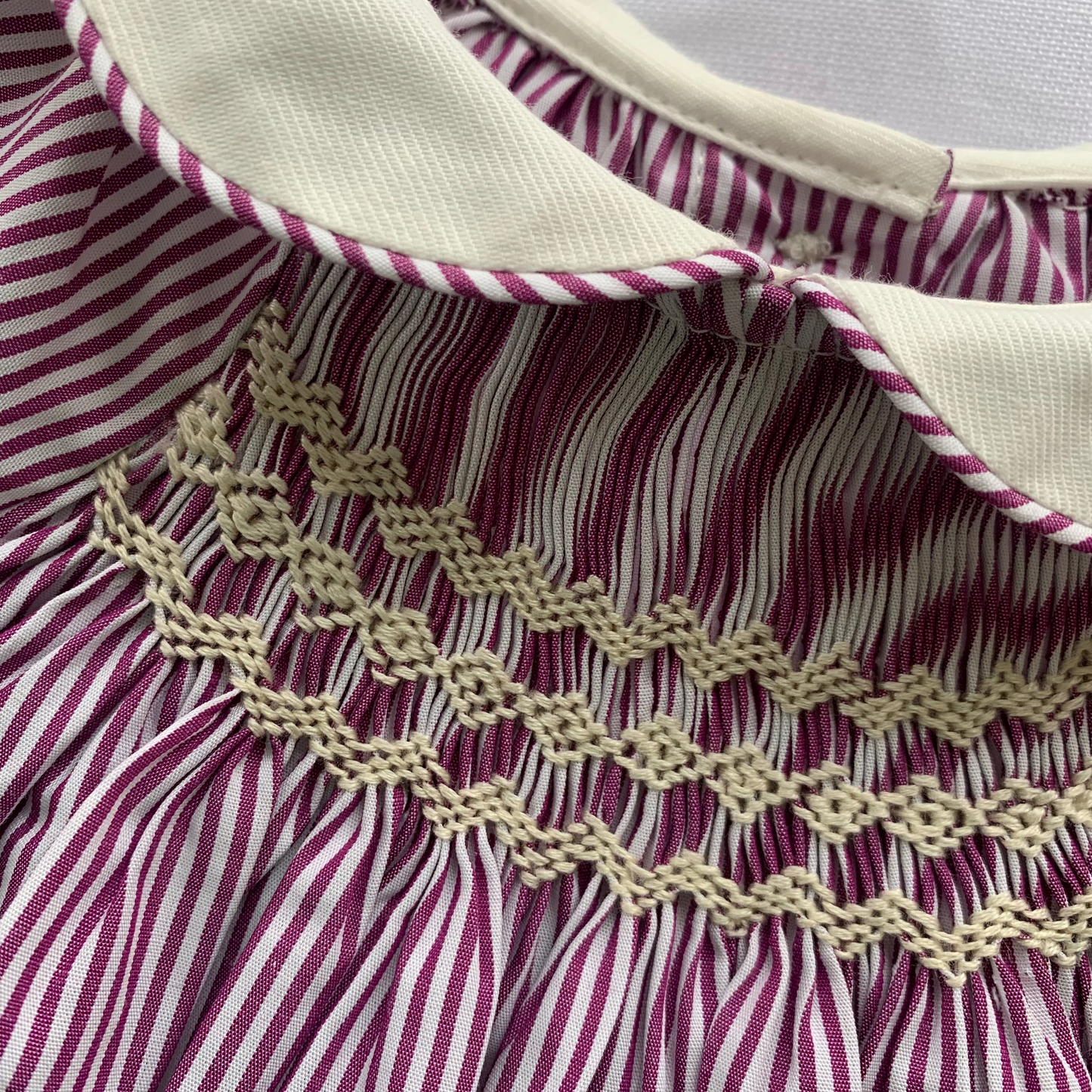 Bilbao Romper, cotton baby girl romper, collar and smocking detail — Willowby, sizes 6–18 months
