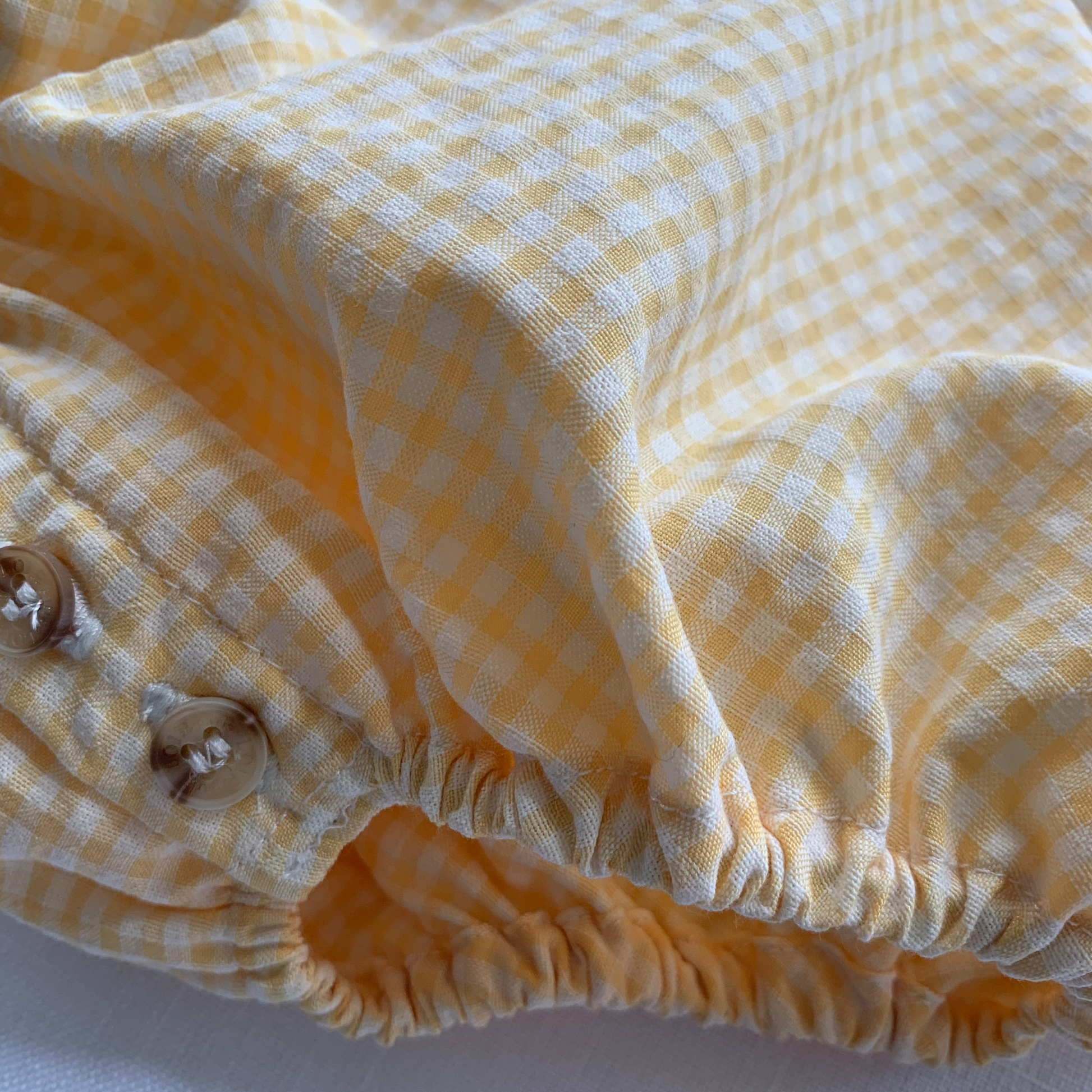 Marta Romper, yellow gingham cotton baby girl romper, detail — Willowby