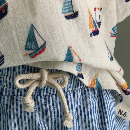 Short Sleeve Caravan Shirt on mannequin, baby boy organic cotton henley shirt , boat print, paired with coordinating shorts— Willowby, sizes 6–18 months
