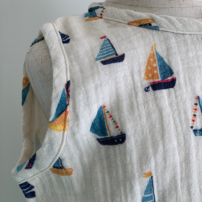 Cedar Suit on mannequin, baby organic cotton romper  close up, boat print— Willowby, sizes 6–18 months