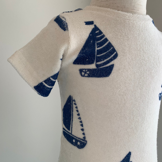 River Terry Tee on mannequin close up, baby boy organic cotton terry t-shirt with boat print— Willowby, sizes 6–18 months